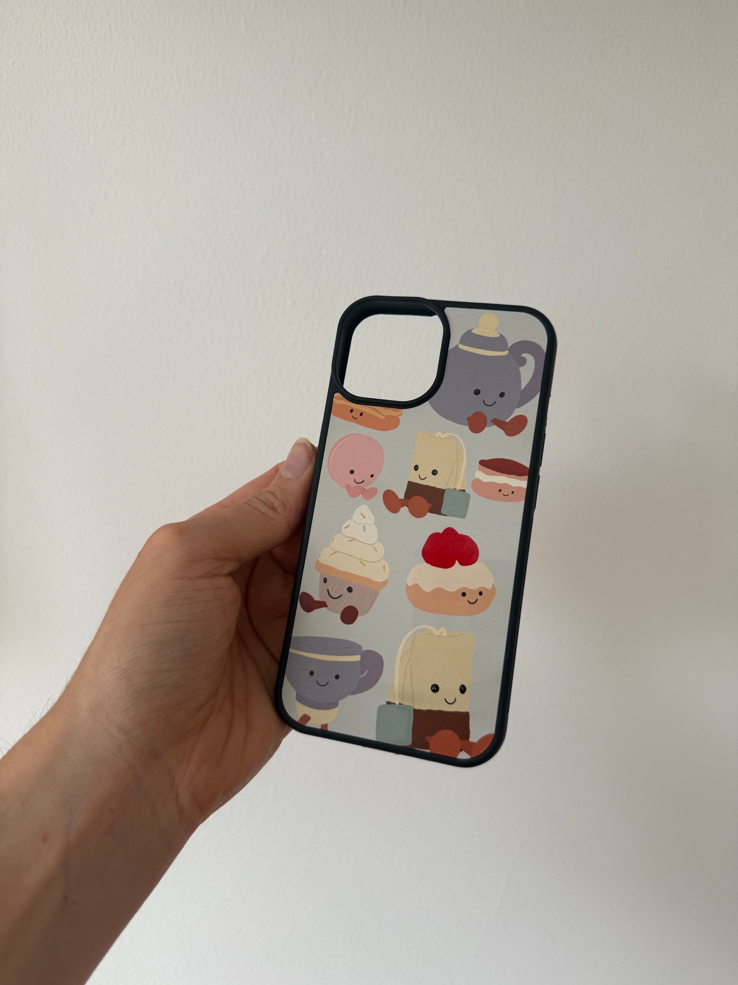 Afternoon Tea phone case. Blue background. Cuddly toys.