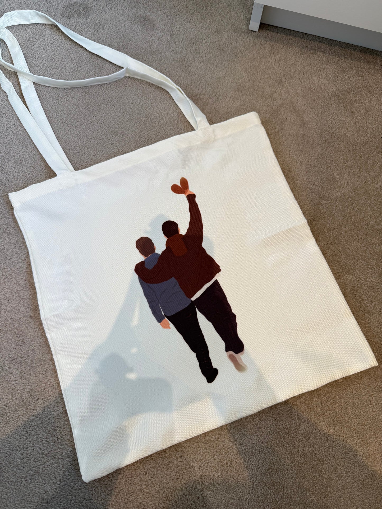 Liam and Noel tote bag. Oasis Live 25. Cream