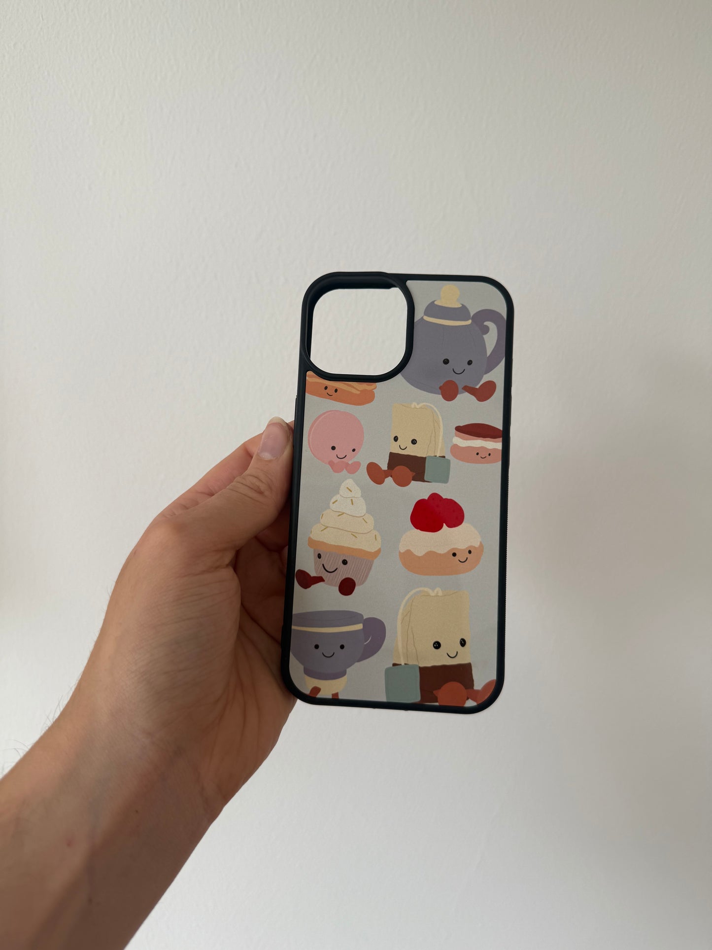 Afternoon Tea phone case. Blue background. Cuddly toys.