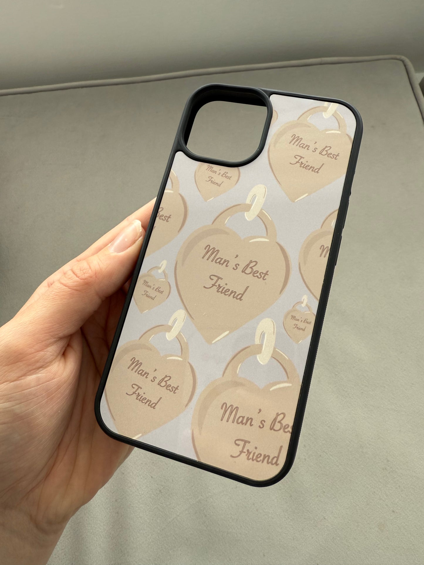 Man’s friend phone case. Heart tag. Blue background