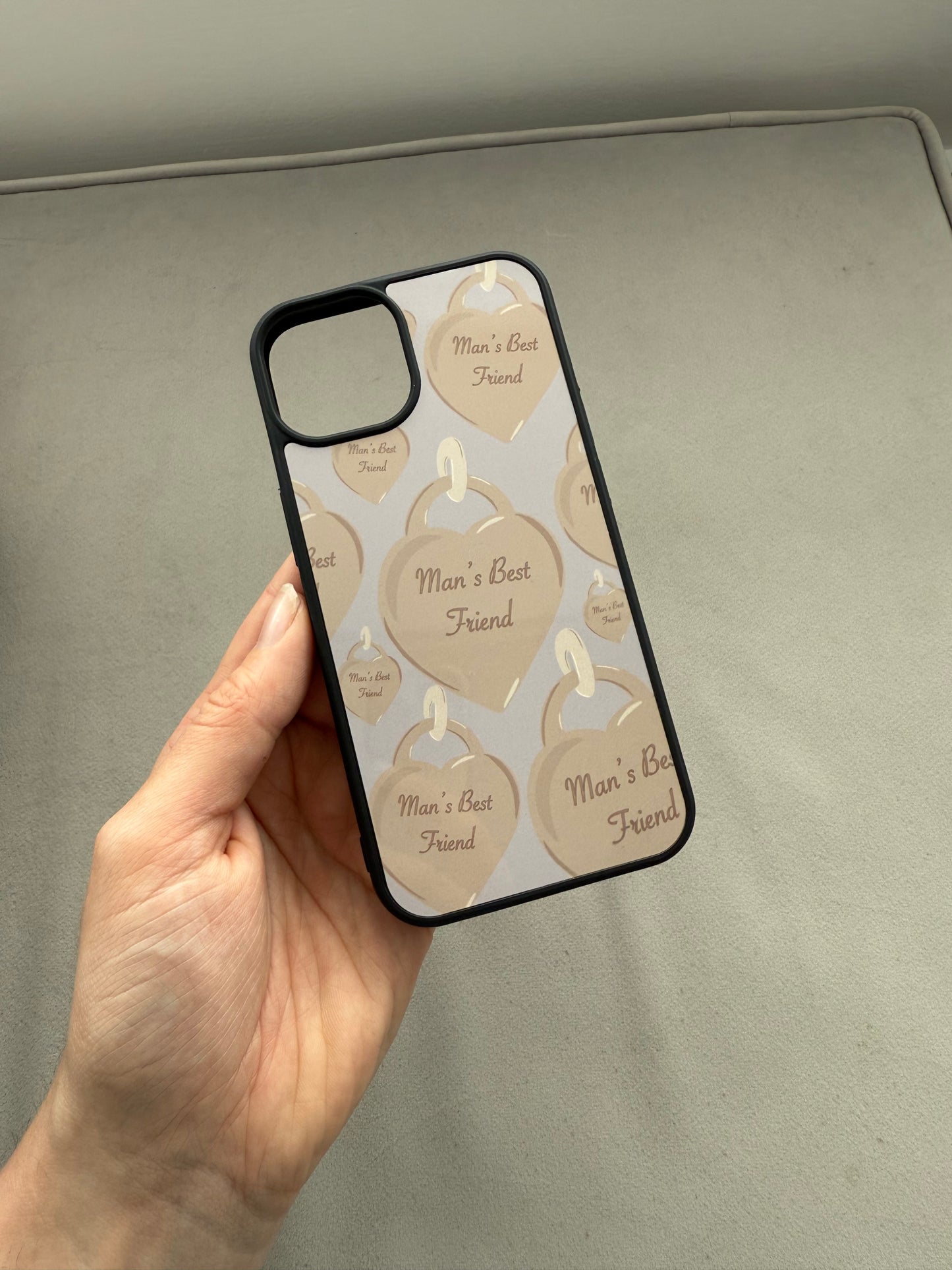 Man’s friend phone case. Heart tag. Blue background