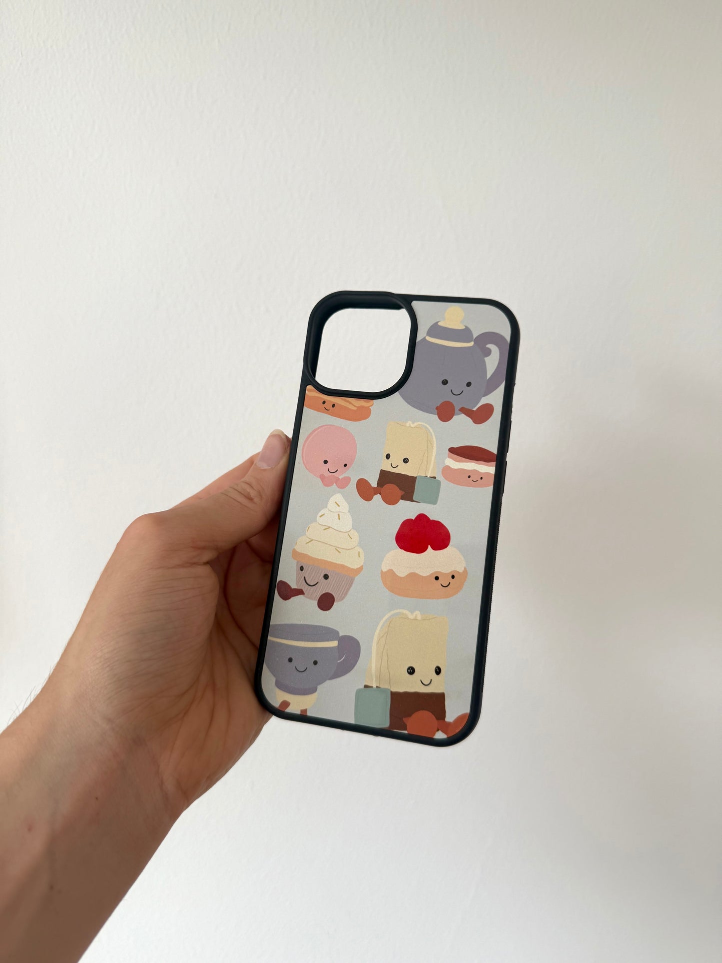 Afternoon Tea phone case. Blue background. Cuddly toys.