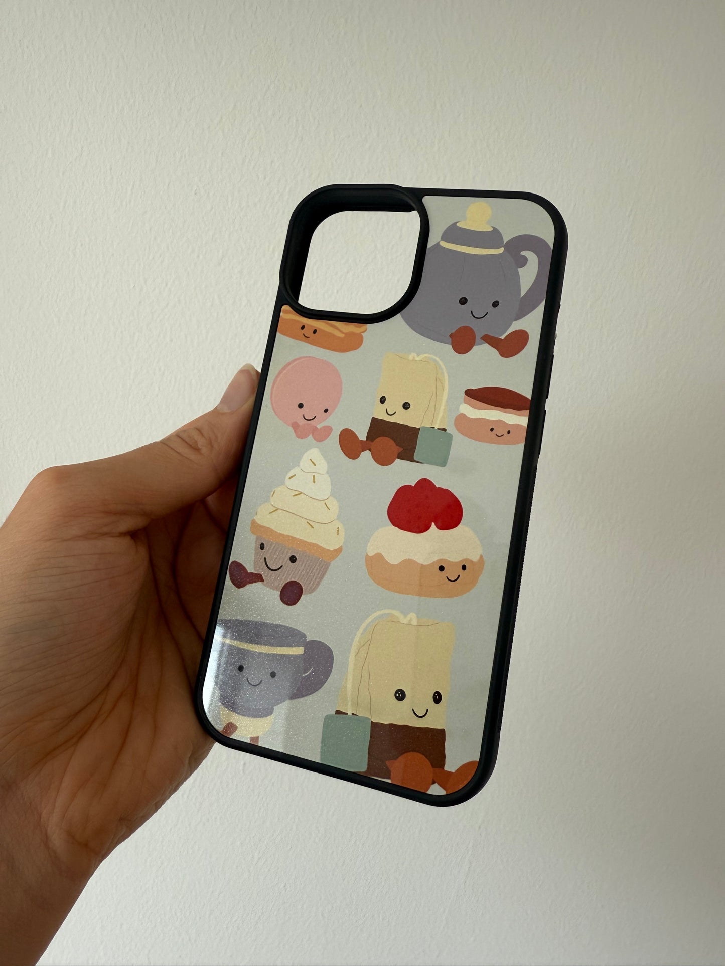 Afternoon Tea phone case. Blue background. Cuddly toys.