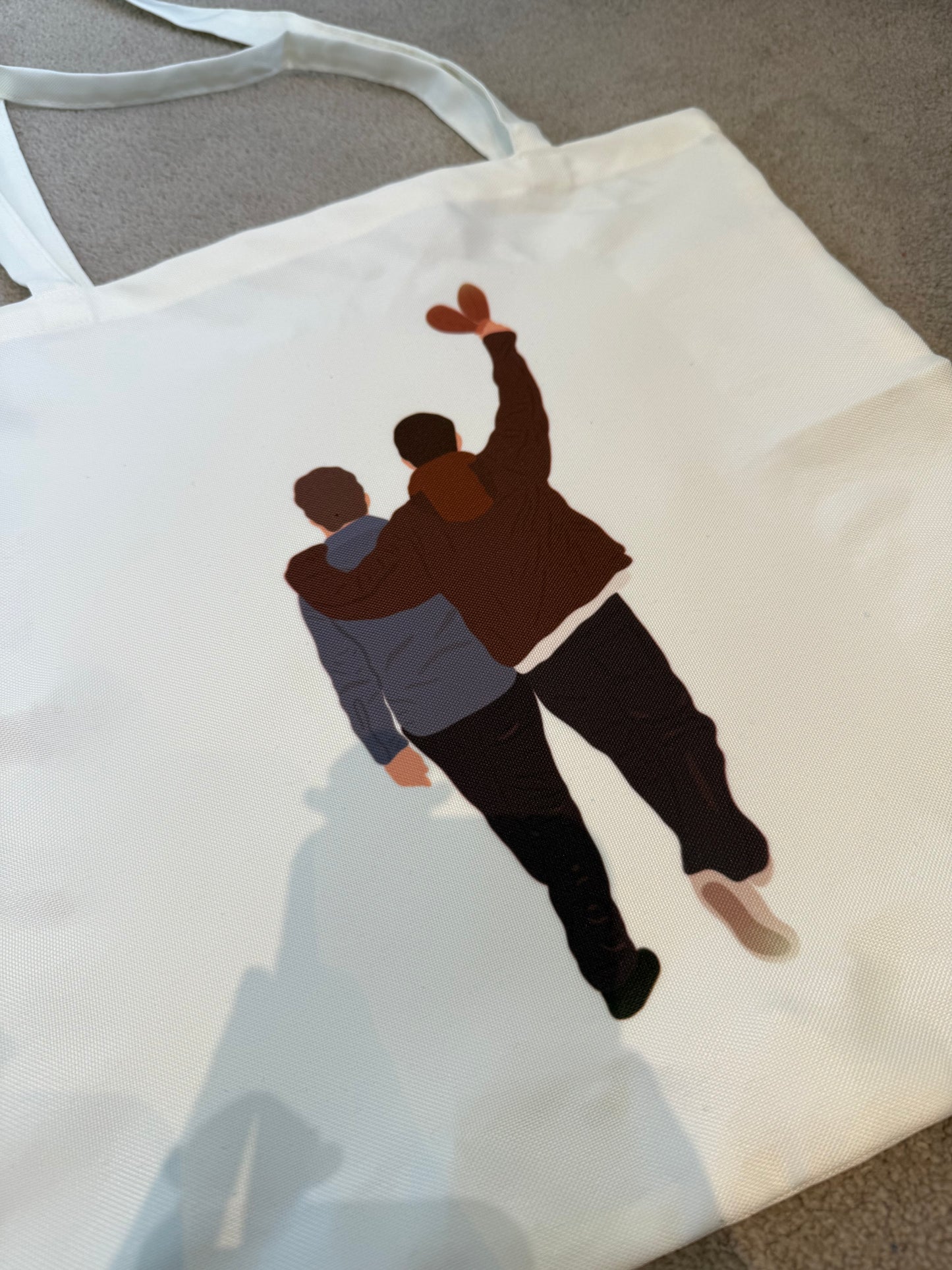 Liam and Noel tote bag. Oasis Live 25. Cream