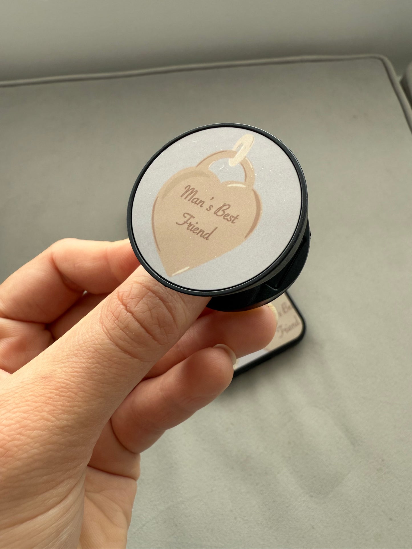 Man’s friend phone pop socket. Heart tag