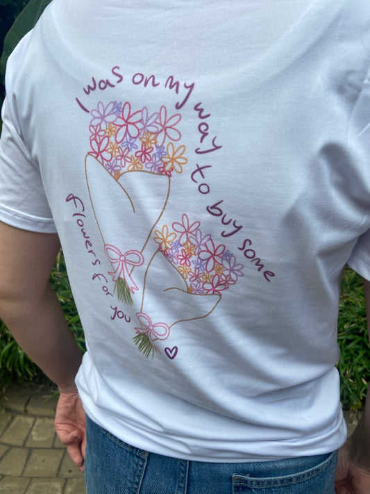 Grapejuice T-shirt. “I was on my way to buy some flowers for you”