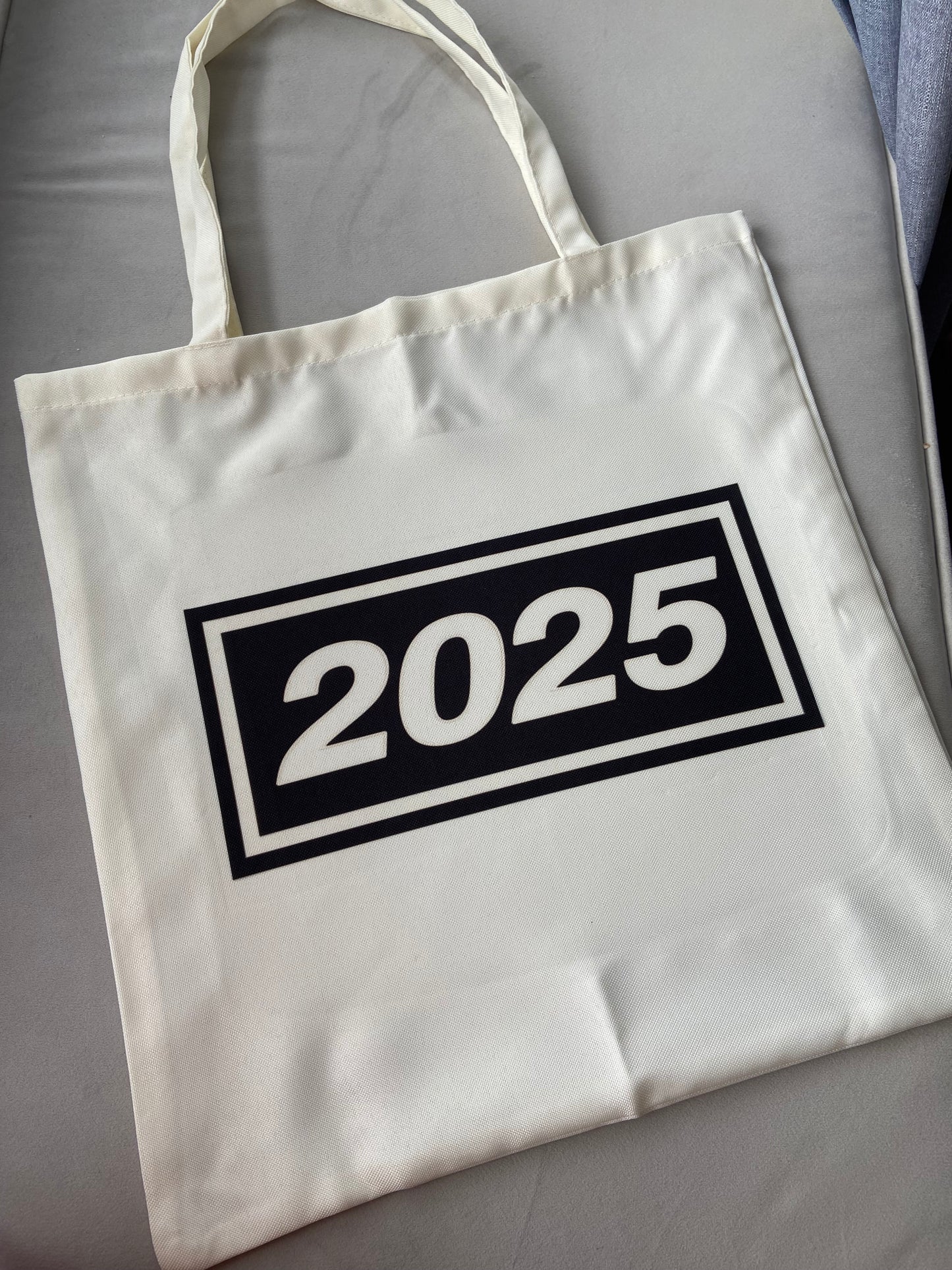 Oasis live 2025 tote bag. Cream