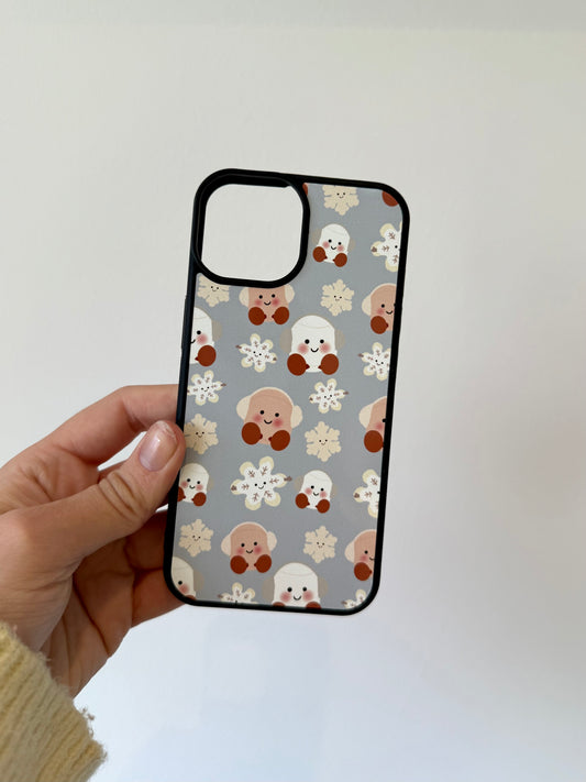 Marshmallow and snowflake phone case. Christmas. Blue background. Cuddly toys.