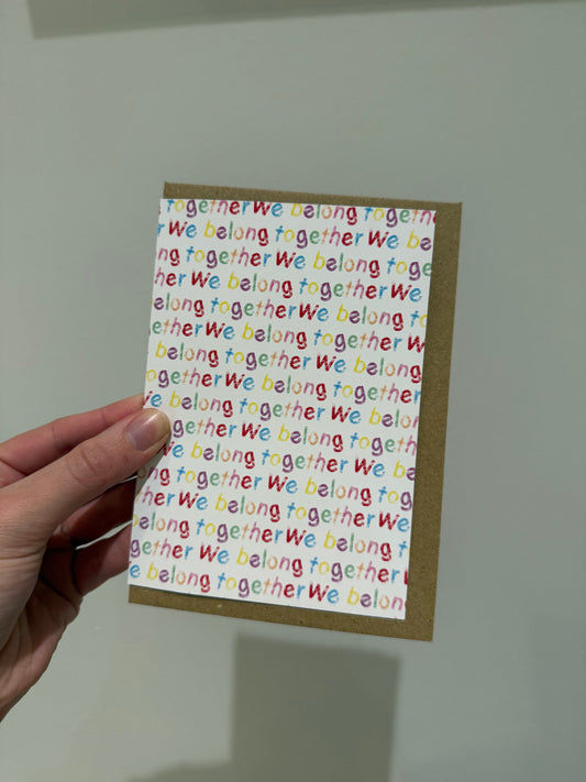 “We belong together”. A6. Multi coloured writing