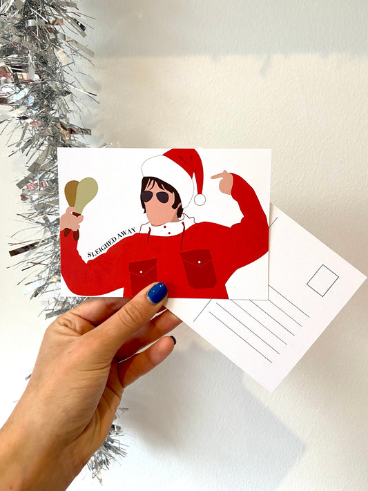 Sleighed away Christmas postcard. Liam as Santa