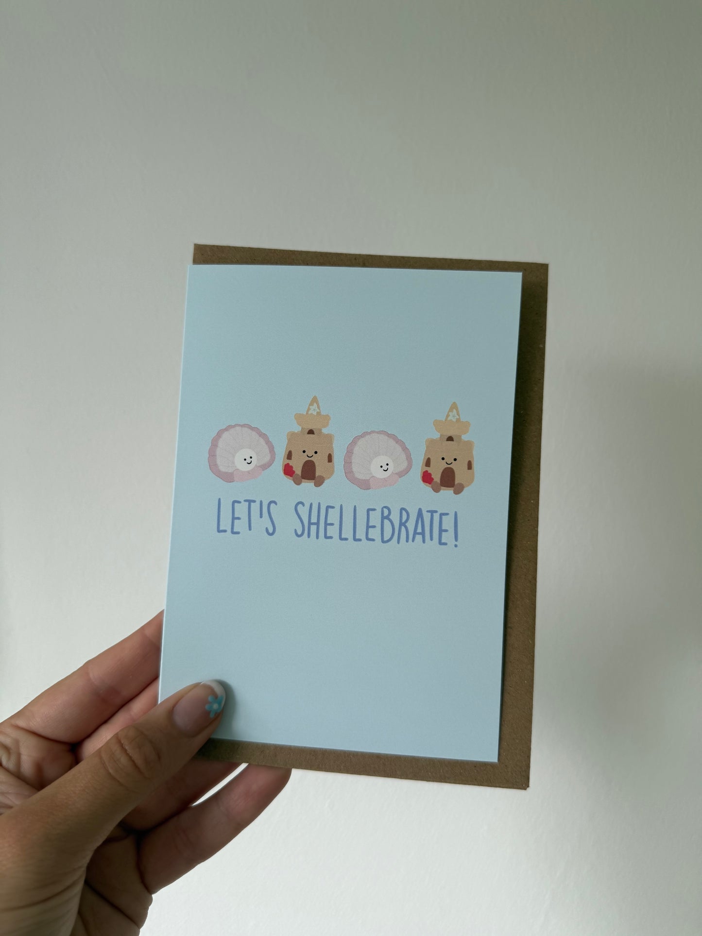 Sea shell celebration card. A6. Let’s shellebrate. Seaside