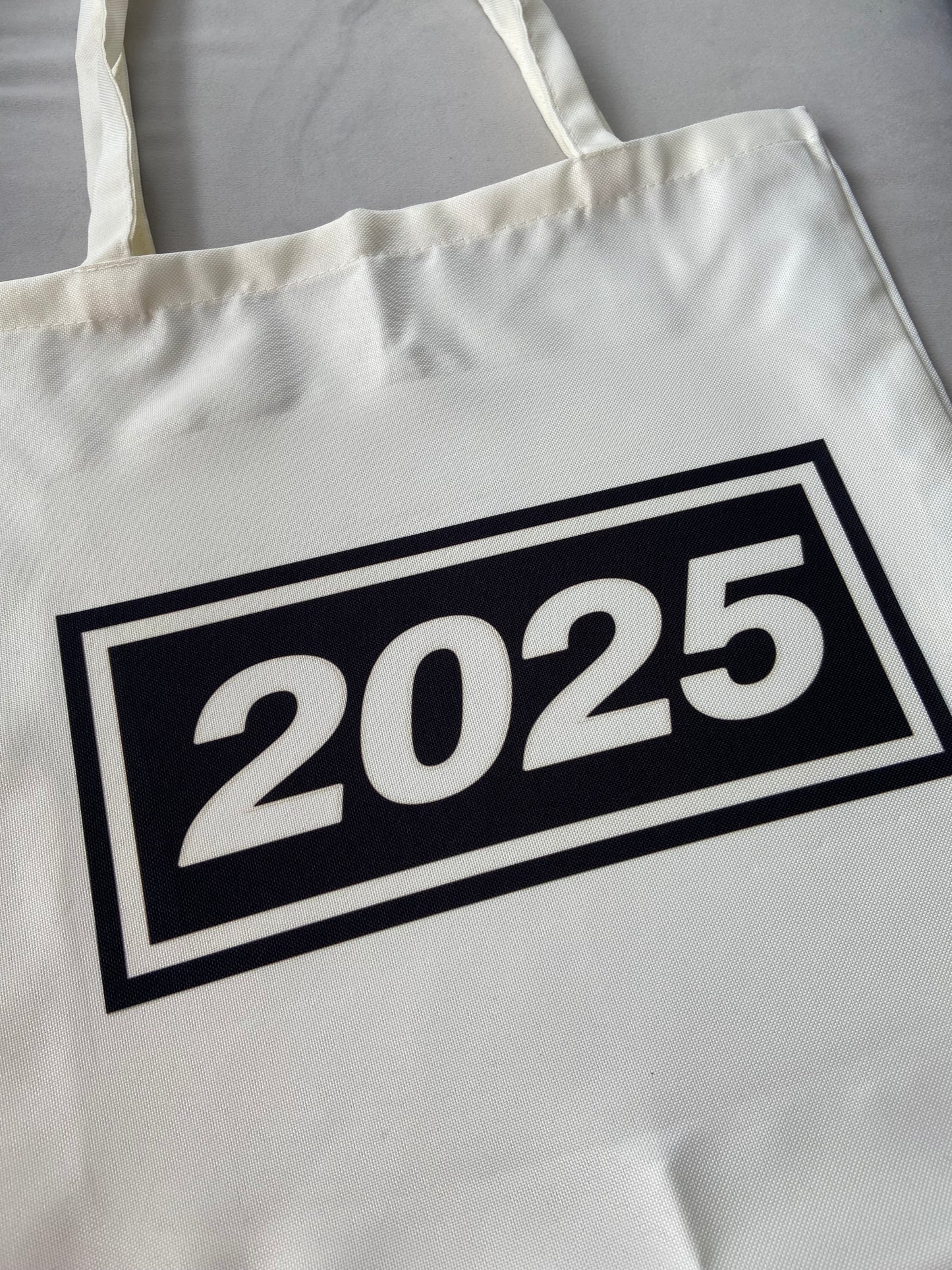 Oasis live 2025 tote bag. Cream