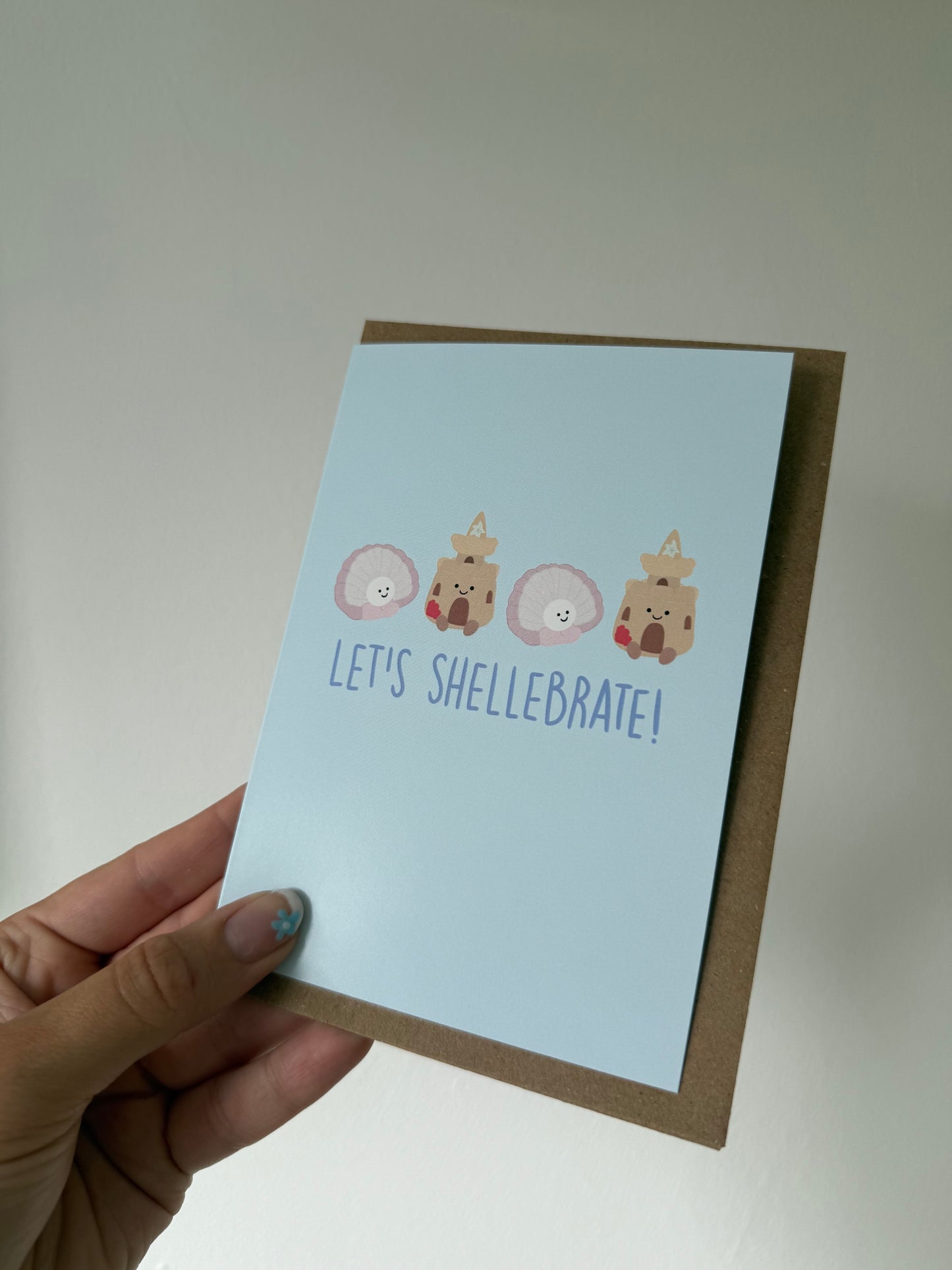 Sea shell celebration card. A6. Let’s shellebrate. Seaside