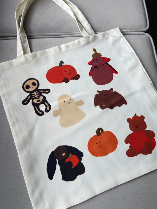 Halloween tote bag. Cuddly toy. Cream